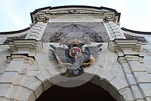 Russian coat of arms over the arch of the Peter Gate. Peter-Pavel`s Fortress. St. Petersburg.