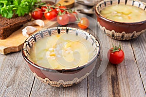 Russian cuisine: meat soup with pickled cucumbers