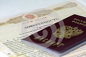 Russian documents. Notarial form of power of attorney to another person. Russian passport lies on top