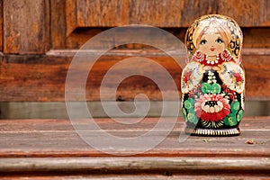 Russian doll isolated on bench