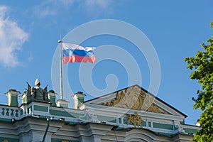 The Russian Federation flag flies over the building.