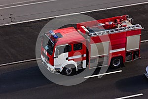 Russian firefighting services EMERCOM drive through the city streets, Russia, St. Petersburg, August 2020. photo