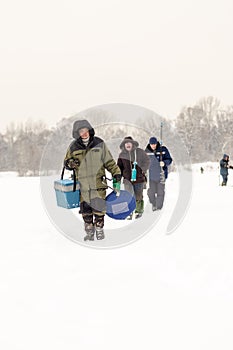 Russian Fishermen Ice Fishing in Winter
