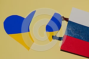 the Russian flag takes the Ukrainian heart, a creative illustration of seizing territory, PEACE photo