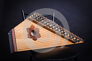 Russian folk musical instruments. Gusli isolated on a black background
