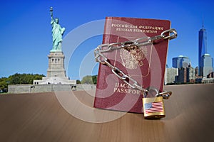 Russian foreign passport with metal chain and lock. USA Department of State blocked limited US visa issue for Russian people. US A