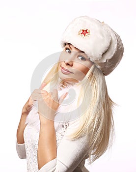 Russian girl wearing military hat isolated on white