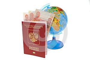 Russian Inaternational passport with money and globe isolated on photo