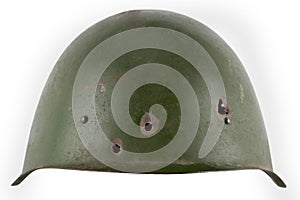 Russian invasion in Ukaraine 2022. Old type russian army helmet with three bullet holes