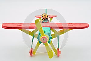Matryoshka doll mounted on a toy plane photo