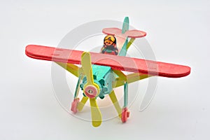 Matryoshka doll mounted on a toy plane photo