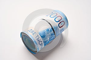 Russian money roll ruble on a white background