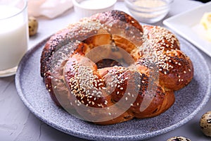 Russian national bread Kalach on a gray background.