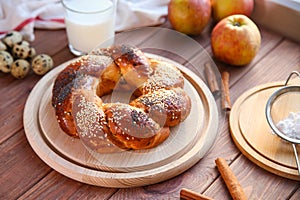 Russian national bread Kalach on a wooden background