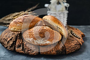 Russian national bread Kalach on a wooden background. National bread products