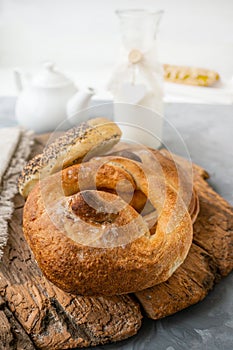 Russian national bread Kalach on a wooden background. National bread products