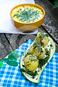 Russian national dish - Boiled potatoes and okroshka