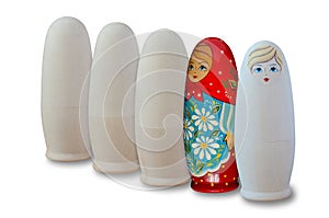 Russian nesting dolls. Painted and unpainted. Isolated on white