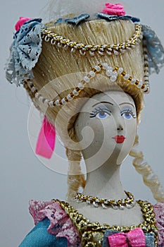 Russian noble woman doll with generously decorated hairdo