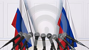Russian official press conference. Flags of Russia and microphones. Conceptual animation