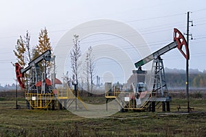 Russian oil pumpers in the fog