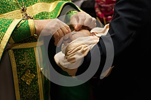 Russian Orthodox baptism. Temple of the Three Hierarchs, Ulyanovsk. photo