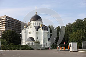 Russian Orthodox church in Krasnogorsk district, Novyy, Moscow Oblast. Luke Church, Archbishop Crimean. White facade with black