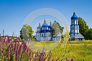 Russian orthodox Church of the Nativity of the Virgin in Pechera, Ukraine, new and beautiful temple in a field