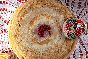 Russian pancake blini with berries and sour cream