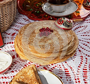 Russian pancake blini with berries and sour cream