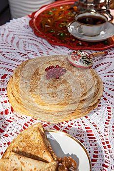 Russian pancake blini with berries and sour cream