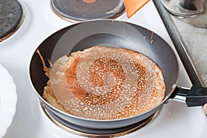 Russian pancake on pan