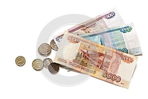 Russian paper money and coins on a white background