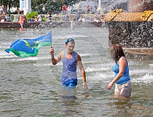 Russian paratrooper demobilized with the flag and girl