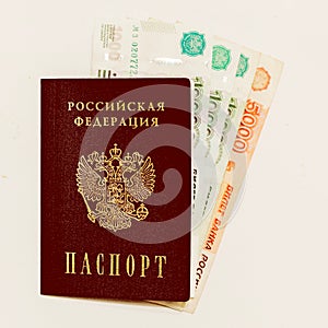 Russian passport and cash on whine
