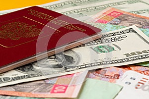 Russian passport on heap of money close up