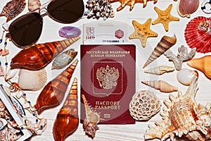 Russian passport with money and different shells