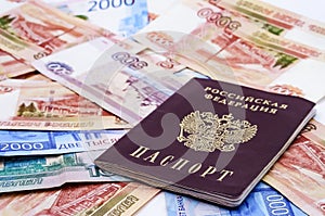 Russian passport and money, passport document on Russian banknotes
