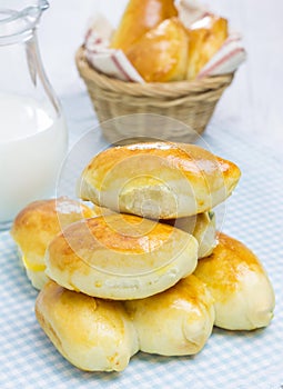 Russian pastries (pirogi) and milk