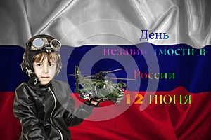 Russian patriotic background. Russian A boy salutes his hand,  Inscription in Russian- Independence Day in Russia, June 12