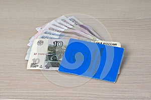 Russian pension certificate and Russian small money - 10, 50, 100, 500 rubles