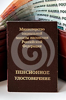 Russian pension certificate and wallet with russian rubles.
