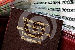 Russian pension certificate and wallet with russian rubles.