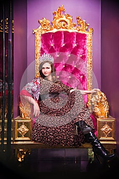 Russian queen sitting on throne. Fairy tale