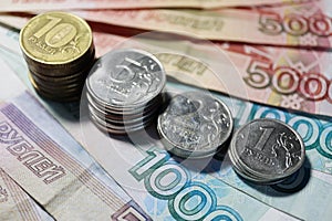 Russian roubles banknotes and coins background closeup