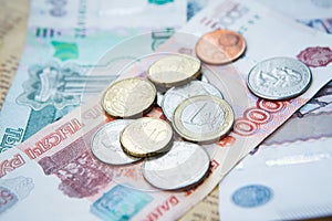 Russian roubles banknotes and euro and dollars coins