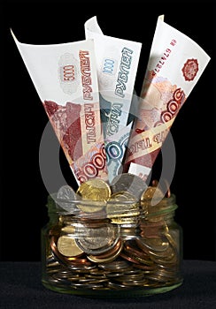 Russian roubles in a glass can photo