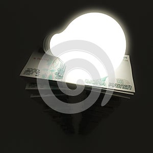 Russian roubles stack with shiny lightbulb