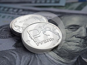 Russian ruble on dollars background