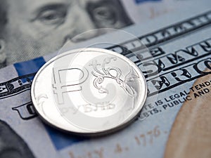 Russian ruble on dollars background